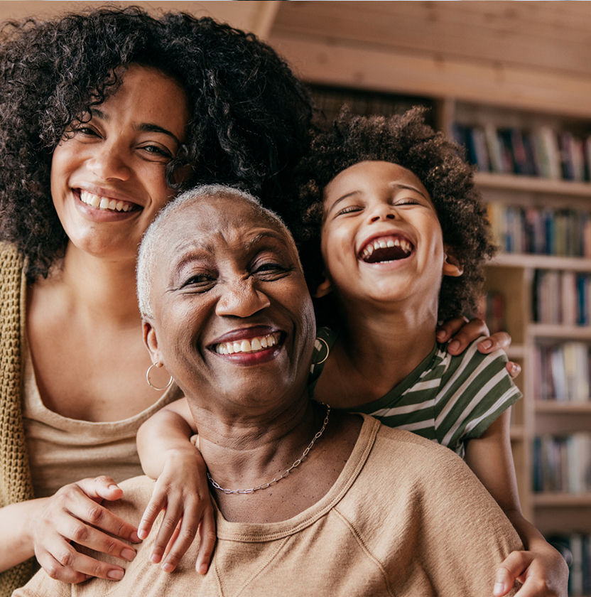 Black family smiling at camera