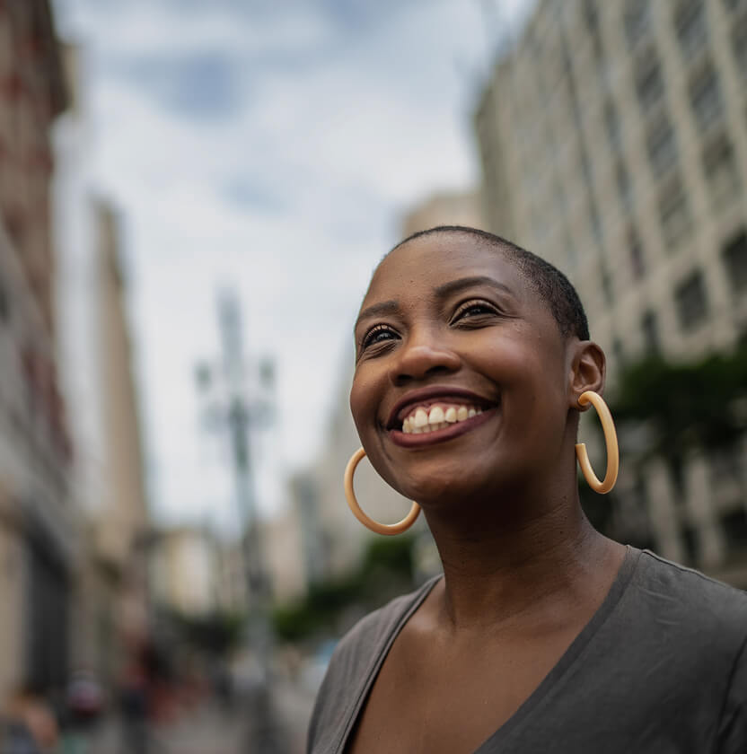 Smiling woman in city
